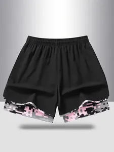 Close-up of double-layered athletic shorts featuring pink pixel camo inner lining