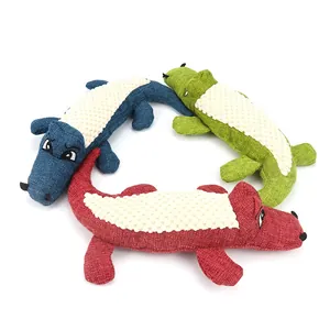 Jouets en peluche pour chiens en forme de crocodile avec couineur en bleu, vert et rouge