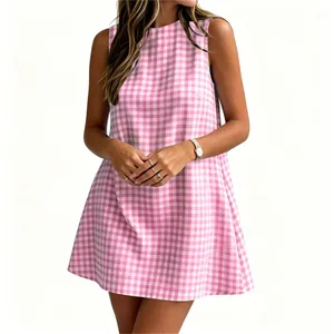 Close-up detail of a women's pink checkered sleeveless round neck casual summer dress