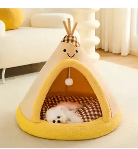 Cozy teepee pet bed with a smiling face design, showing a white dog sleeping inside