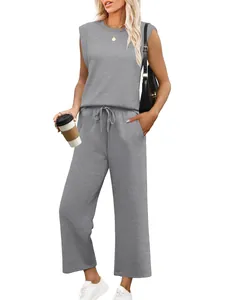 Women's chic grey two-piece set featuring a sleeveless tank top and loose drawstring pants.