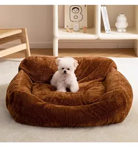 Soft plush brown dog bed protective cover shown in a modern cozy room with a puppy