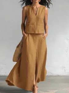 Mustard yellow sleeveless V-neck top and maxi skirt set in breathable linen-like fabric