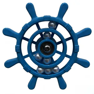 Detailed view of blue parrot ship's wheel toy with spinning white beads for bird cages