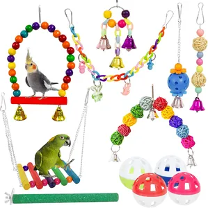 Detailed view of parrot toy set including swings, bells, and colorful chewing balls