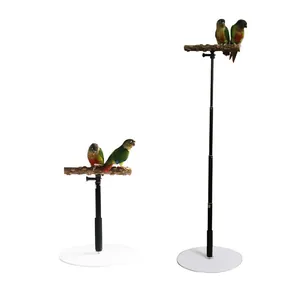 Telescopic parrot stand with natural wood perch and adjustable height for pet birds.