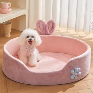 Cómoda cama suave rosa redonda con orejas de conejo para gatos y perros pequeños