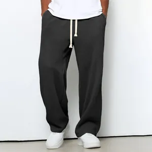 Pantalon de jogging gris foncé pour homme à texture gaufrée et cordon de serrage blanc