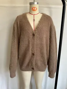 Oversized brown mink velvet knit cardigan with V-neck and buttons on a dress form