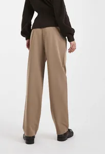 Full back view of elegant khaki high-waist straight-leg trousers for women in studio