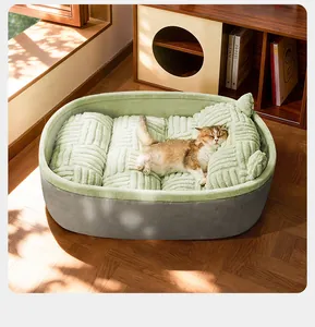 Cozy sage green plush pet bed with textured cushion shown in warm sunlit interior