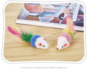 Close-up detail of plush mouse cat toys featuring vibrant multi-colored feather tails.