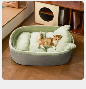 Comfortable soft plush cat bed with cute ears shown in a cozy warm home interior setting