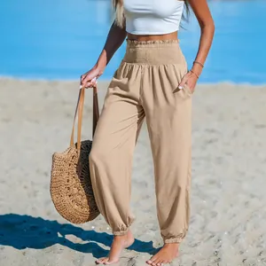 Comfortable loose beige beach joggers with elastic high waist for women in casual style