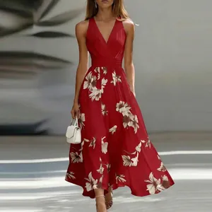Detailed view of an elegant red sleeveless V-neck maxi dress with white floral print.