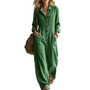Women's green linen utility jumpsuit featuring long sleeves and relaxed wide leg cut