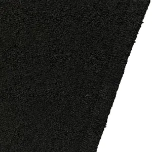Close-up detail of high-quality black textured knit fabric for slim summer dress