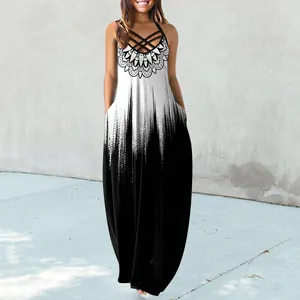 Elegant full-length black and white gradient maxi dress with detailed mandala print
