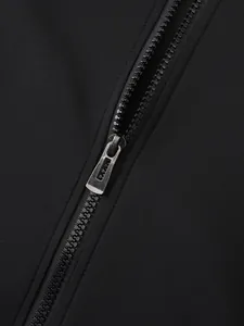 Detailed macro view of a durable black zipper on a premium athletic fabric hoodie