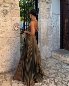 Back view of elegant olive green pleated maxi dress with open back and spaghetti straps