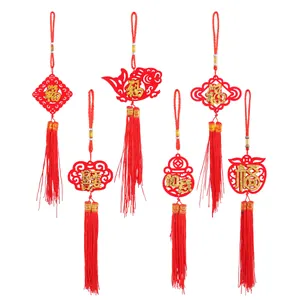 Traditional Chinese New Year felt hanging ornaments with gold Fu characters and red tassels