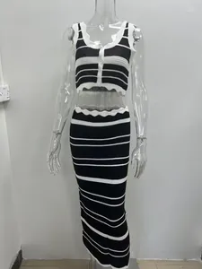 A detailed view of the black and white striped knitted vest and long skirt set for women