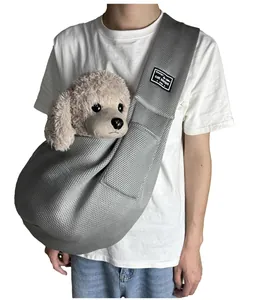 Breathable grey mesh pet carrier bag for small dogs and cats during summer travel