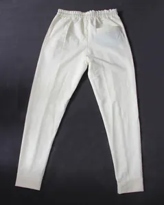 Detailed back view of cream men's athletic sweatpants featuring an elastic waist