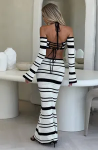 Elegant back view of black and white striped crochet halter top and matching maxi skirt set