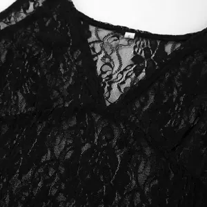 Detailed view of the intricate black floral lace and V-neckline of a sheer dress.