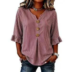 Fashionable women's V-neck striped blouse featuring large buttons and stylish ruffle sleeves