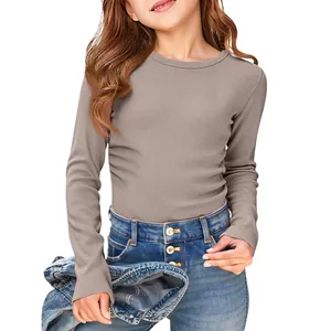 Detailed view of the rib-knit texture on this girls' long-sleeve slim fit T-shirt.