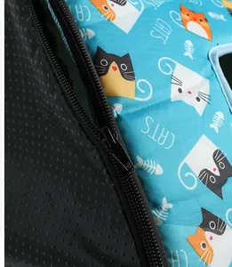 Detailed view of the durable zipper and cute cat pattern on waterproof pet house