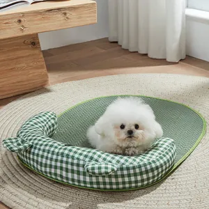 Breathable green checkered dog bed mat for small pets in a cozy bright indoor setting