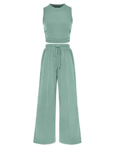 Two-piece sage green ribbed knit set featuring a sleeveless tank top and wide-leg pants