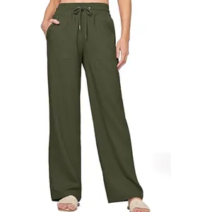 Detailed view of women's high-waisted linen wide-leg pants with drawstring and pockets