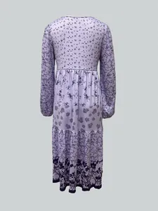 Back view of long-sleeved lavender floral print tiered maxi dress for women