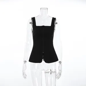 Detail of a chic black square neck sleeveless top with zipper front and peplum waist