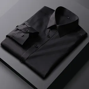 Detailed macro shot of a folded black long-sleeved men's business dress shirt