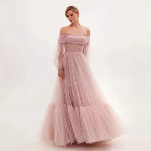 Elegant dusty pink off-shoulder tulle evening gown with long sleeves and tiered skirt