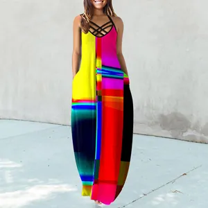 Detailed view of summer sleeveless maxi dress with vibrant geometric abstract print.