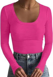 Close-up detail of women's vibrant pink ribbed round neck long sleeve slim fit T-shirt.