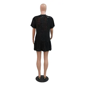 Detailed back view of a stylish black sequin short sleeve dress featuring a ruffled hem