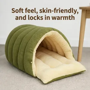 Cozy green corduroy cave bed for cats and small dogs with warm cream plush lining