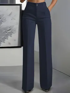 Detail of high-waisted navy blue straight-leg suit trousers for women with clean lines