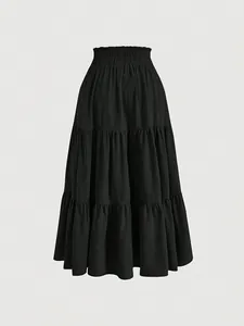 Detailed view of plus size black tiered skirt with elastic high waist fashion