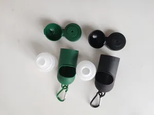 Detailed view of disassembled portable pet waste bag and hand sanitizer dispenser parts