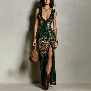 Elegant bohemian floral print sleeveless maxi dress with high slit and ruffle detail
