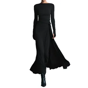 Elegant black long-sleeved wrap maxi dress with knot detail and thumbhole sleeves.