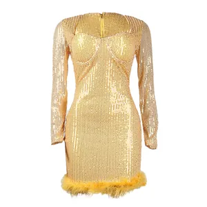 Elegant gold sequined long-sleeve bodycon mini dress with glamorous feather hem detail